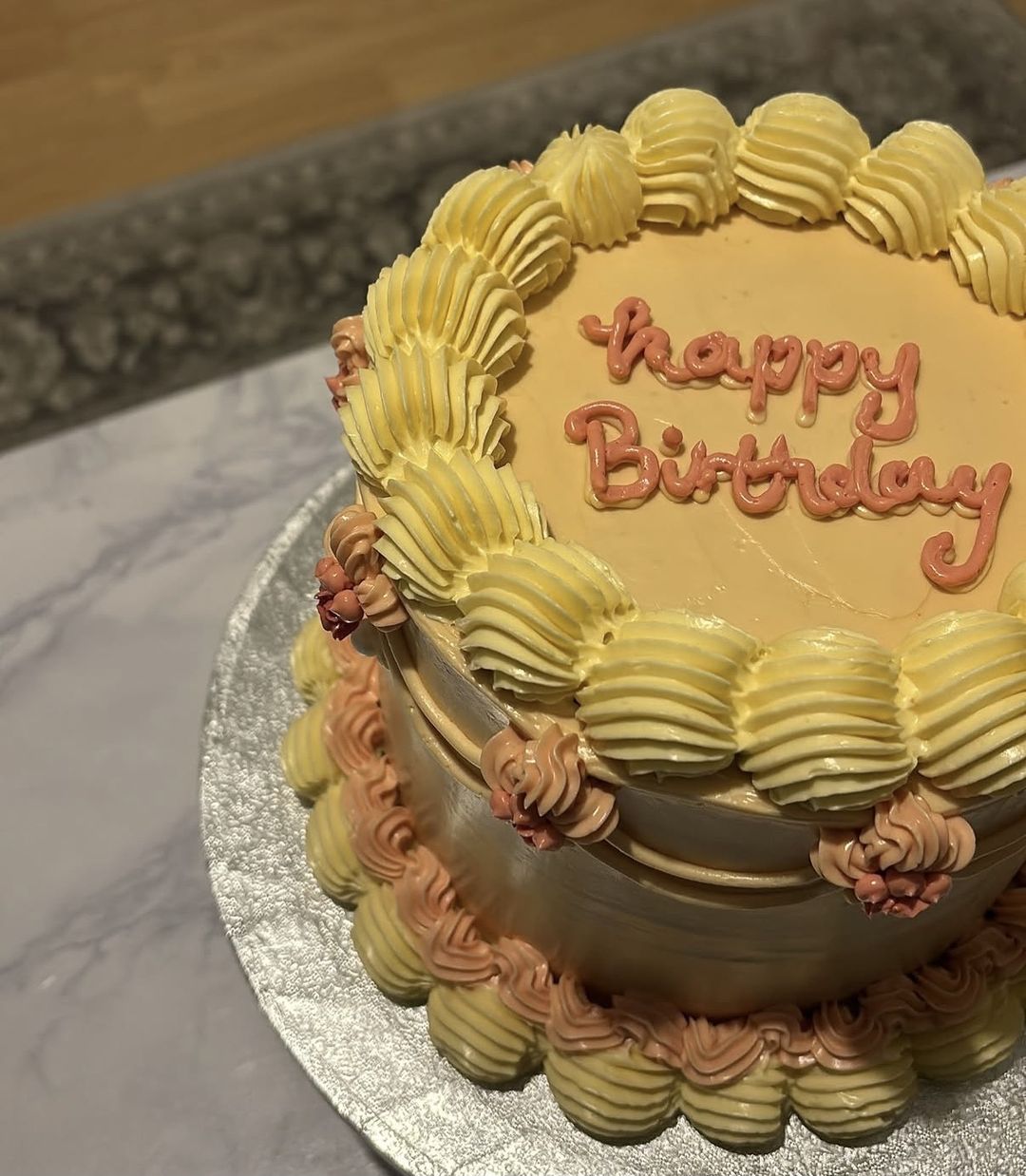 Peach and butter-yellow vintage cake with “Happy Birthday” piped on top (photo 2 of 2)